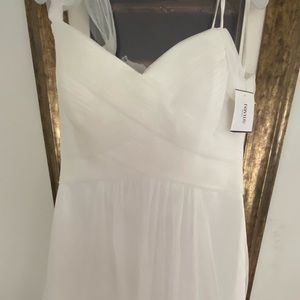 Beautiful wedding gown, never worn.